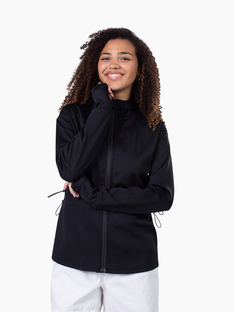 Tall woman wearing Roam Athletic Jacket in black