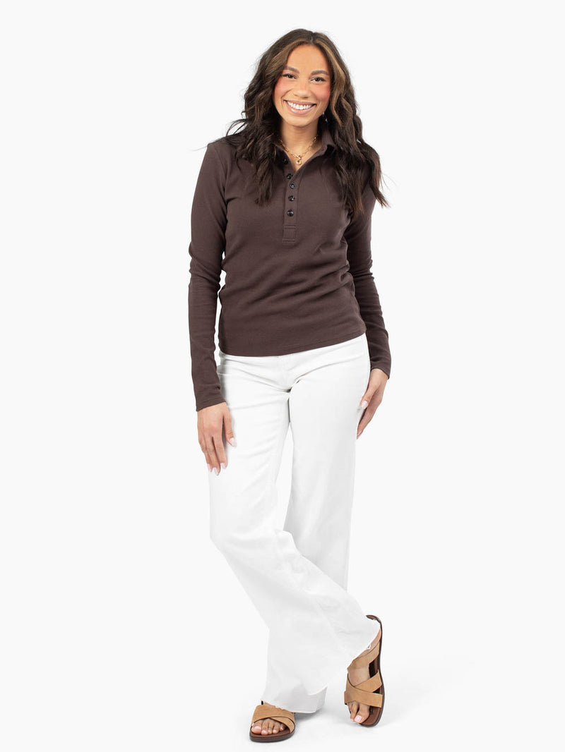 Tall woman wearing Essential Rib Polo front view in Espresso Color