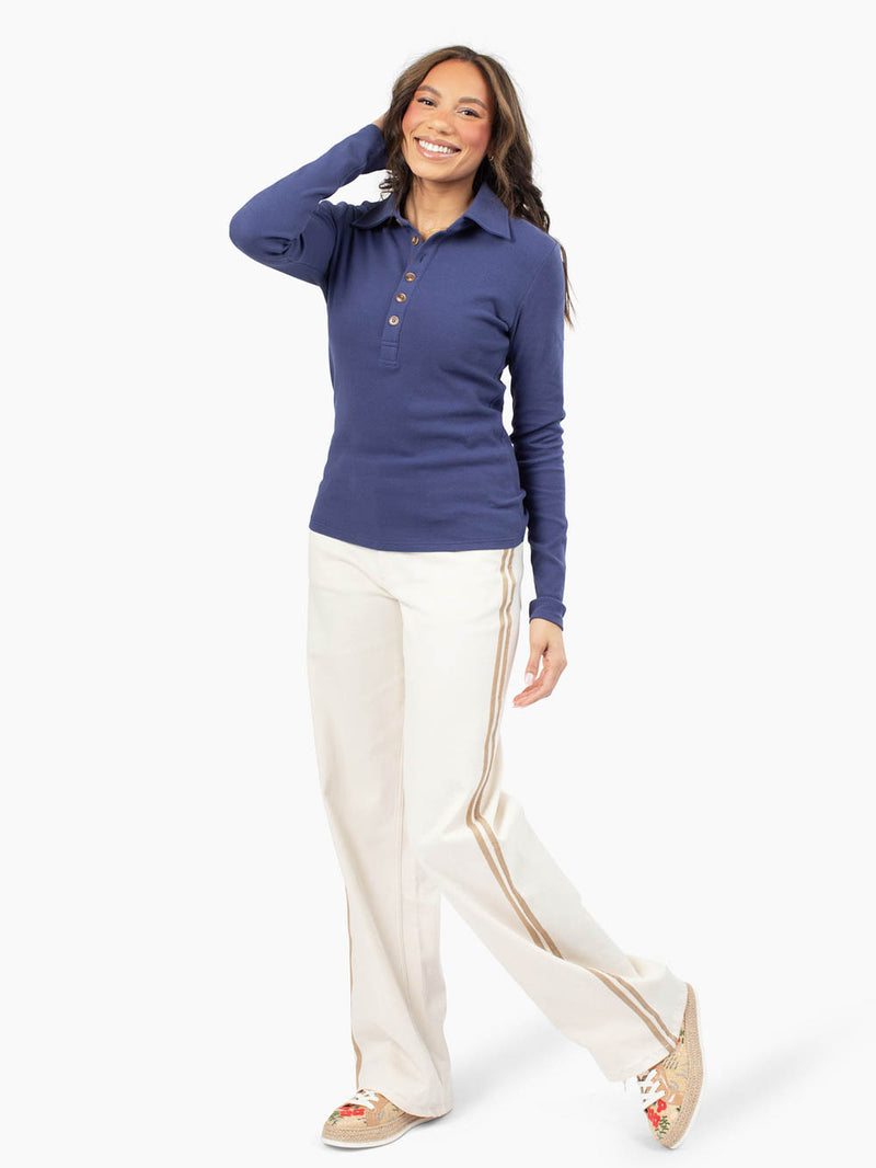 Tall woman wearing Essential Rib Polo front view