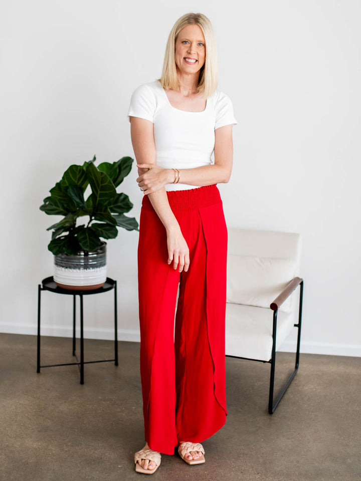 Ribbed cotton tee in white shown on tall model with long torso fit