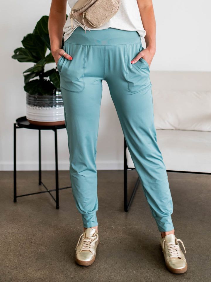 Front view of tall women’s joggers in eucalyptus with 34-inch inseam and utility pocket