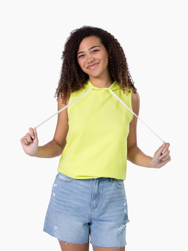 Tall woman wearing Sideline hooded tank in lime punch