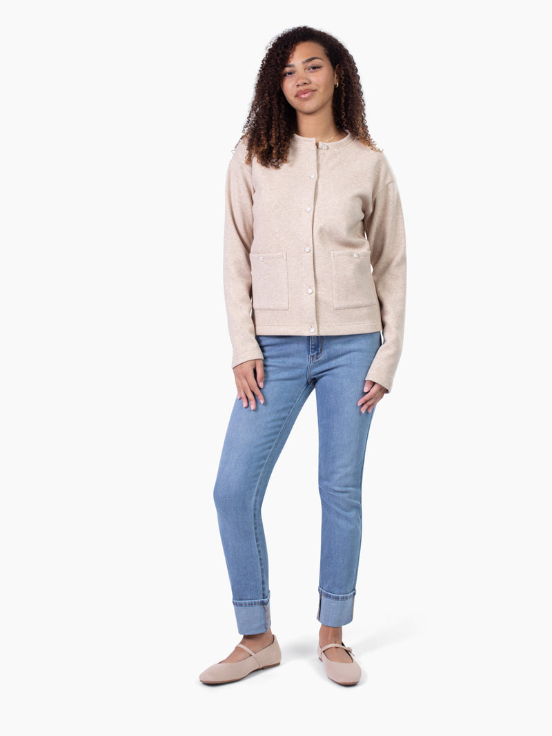 Tall woman wearing Grace fleece cardigan in dune