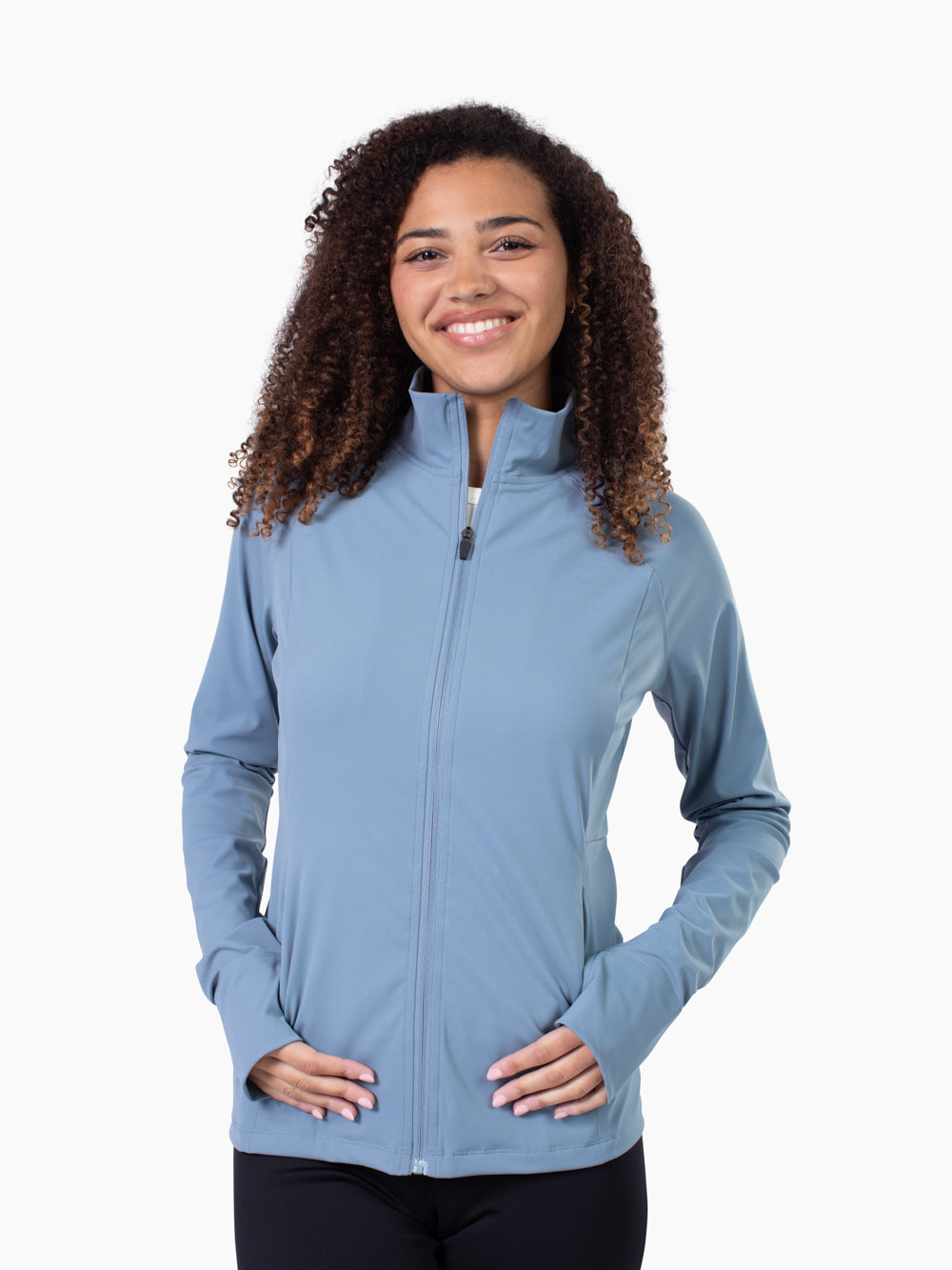 Tall woman wearing Studio Athletic Jacket in steel blue