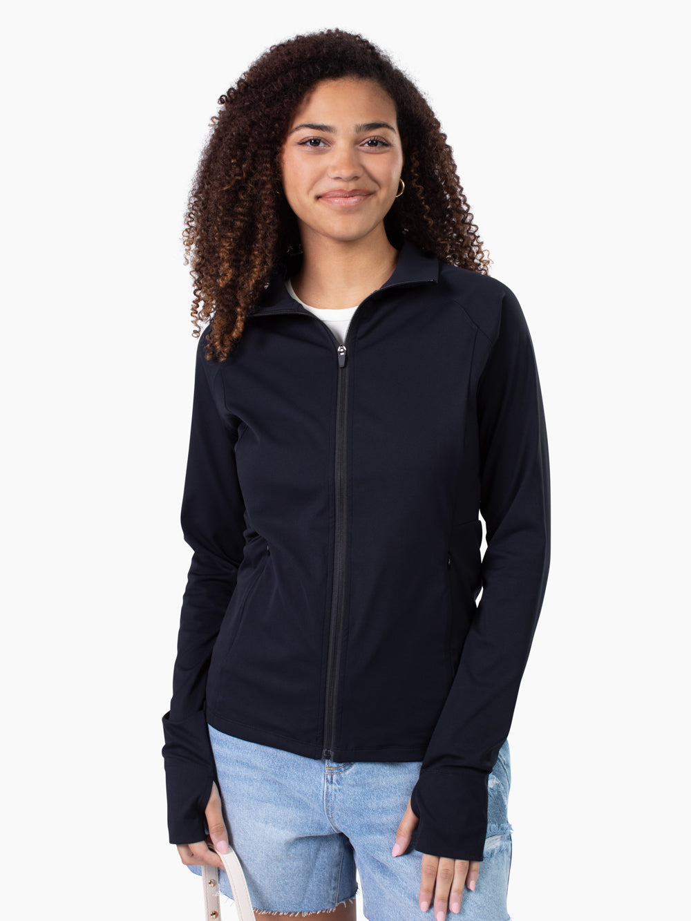 Tall woman wearing Studio Athletic Jacket in black