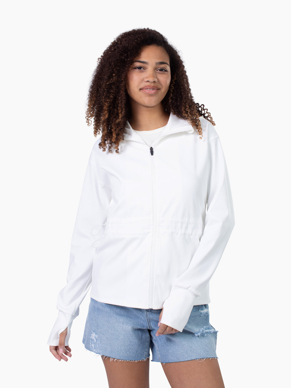 Tall woman wearing Roam Athletic Jacket in white