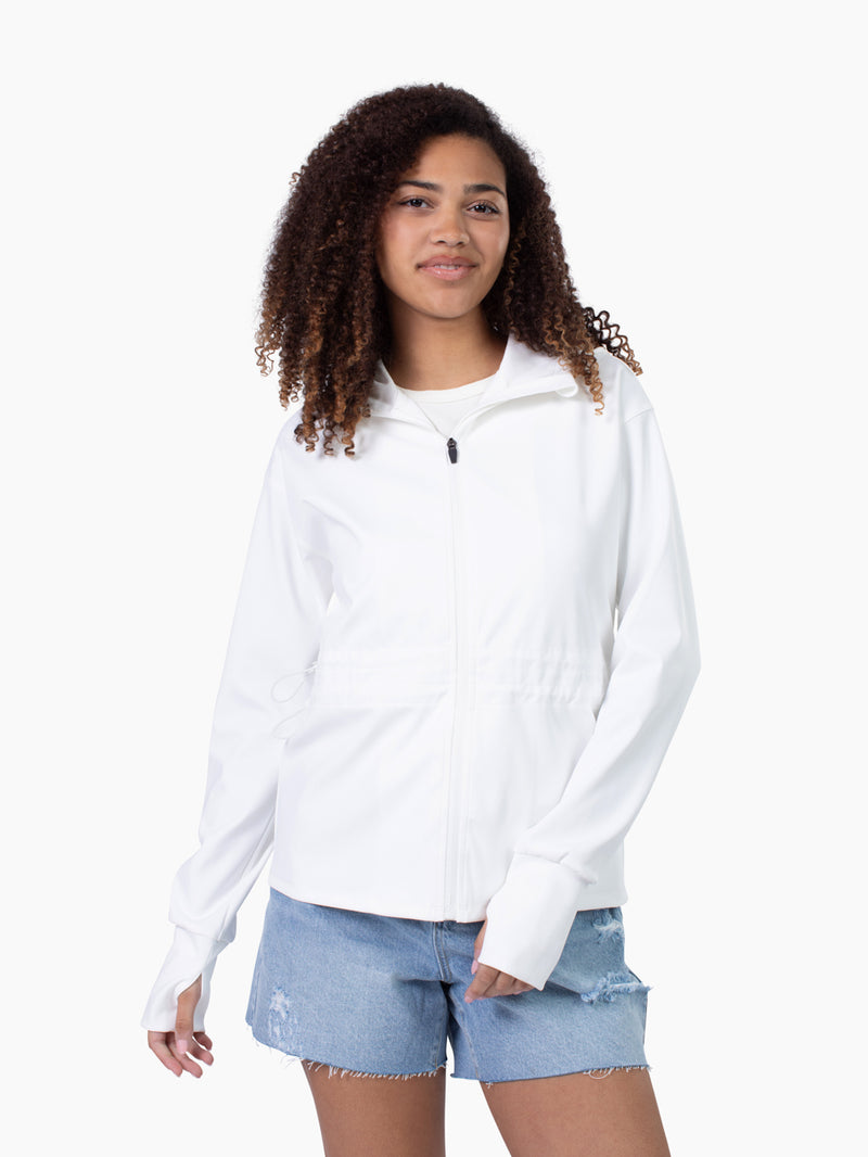 Tall woman wearing Roam Athletic Jacket in white