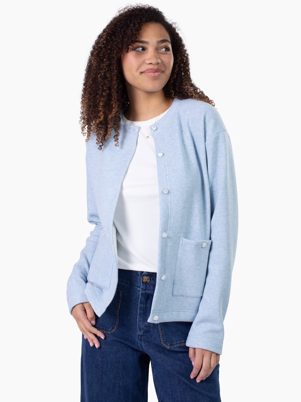 Tall woman wearing Grace fleece cardigan in sky blue
