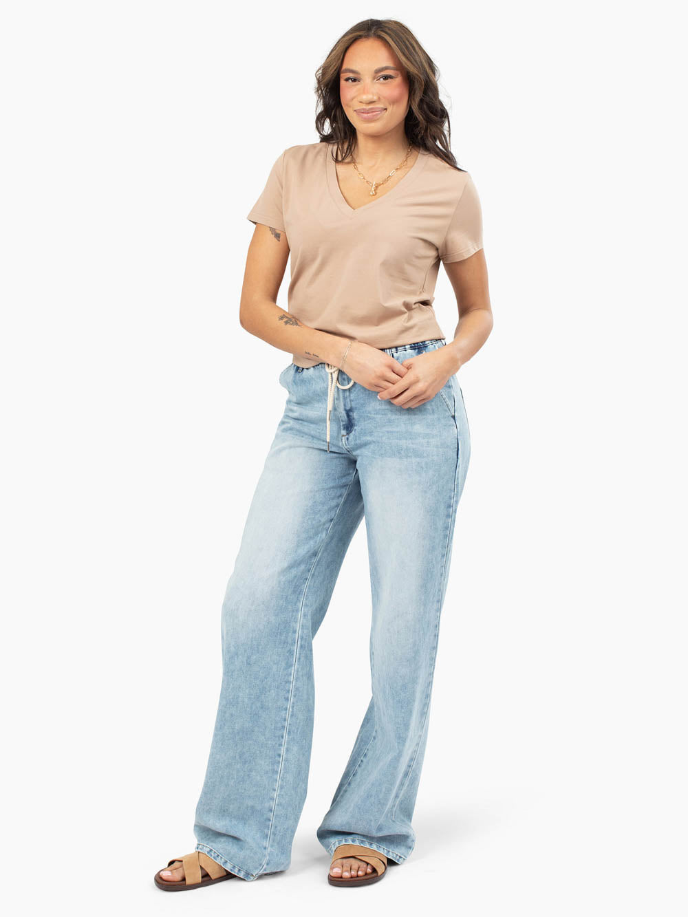 Latte Frame v-neck tee styled with denim for tall women