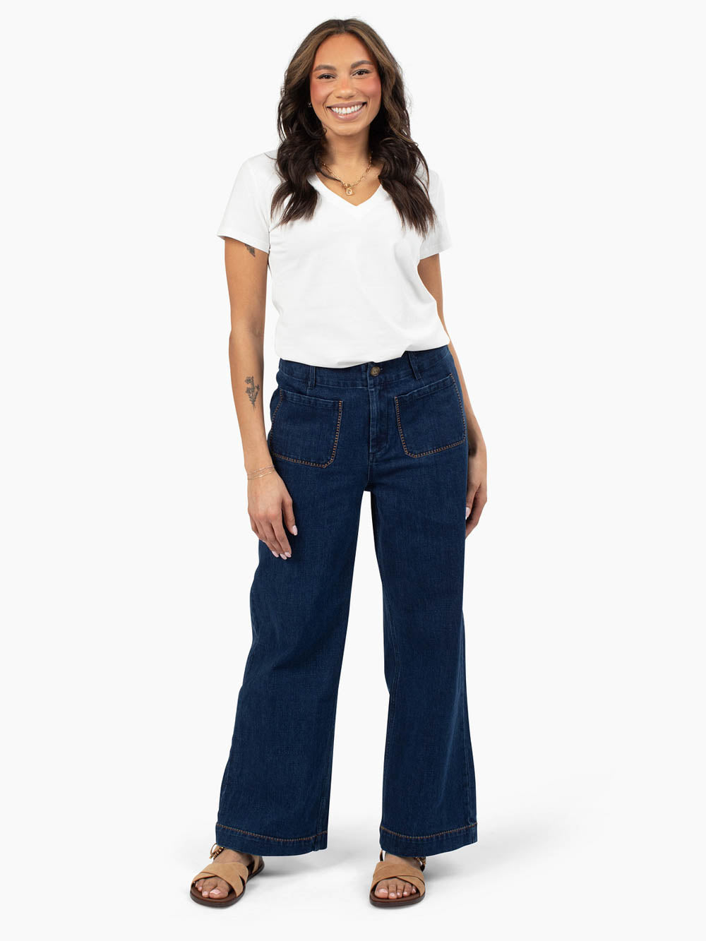 White Frame v-neck tee styled with denim for tall women