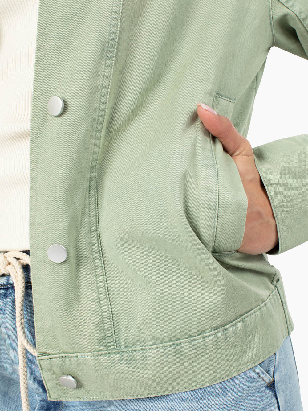 Close up of green cotton twill fabric on Ashton utility jacket