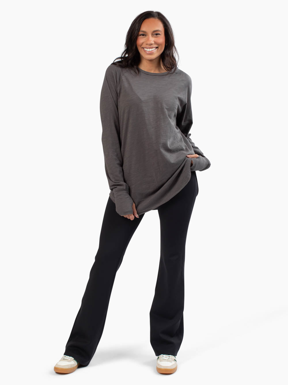 Tall woman wearing lead malley long sleeve tee 