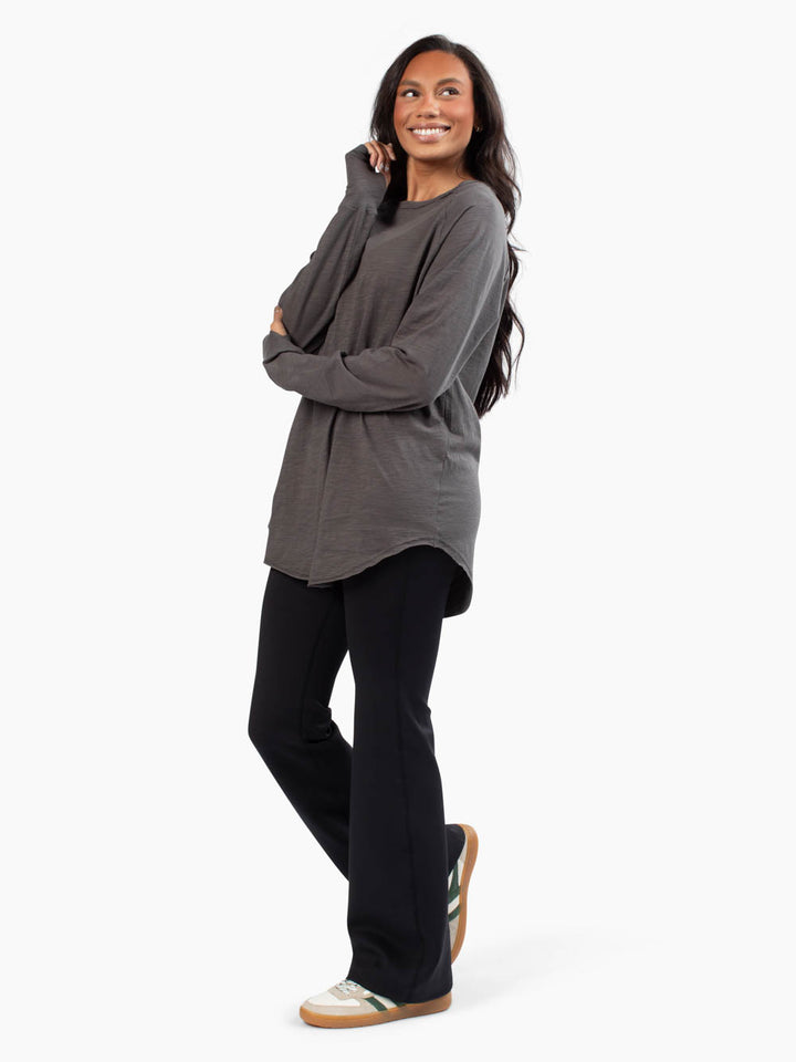 Front view of malley long sleeve tee untucked in lead on tall model