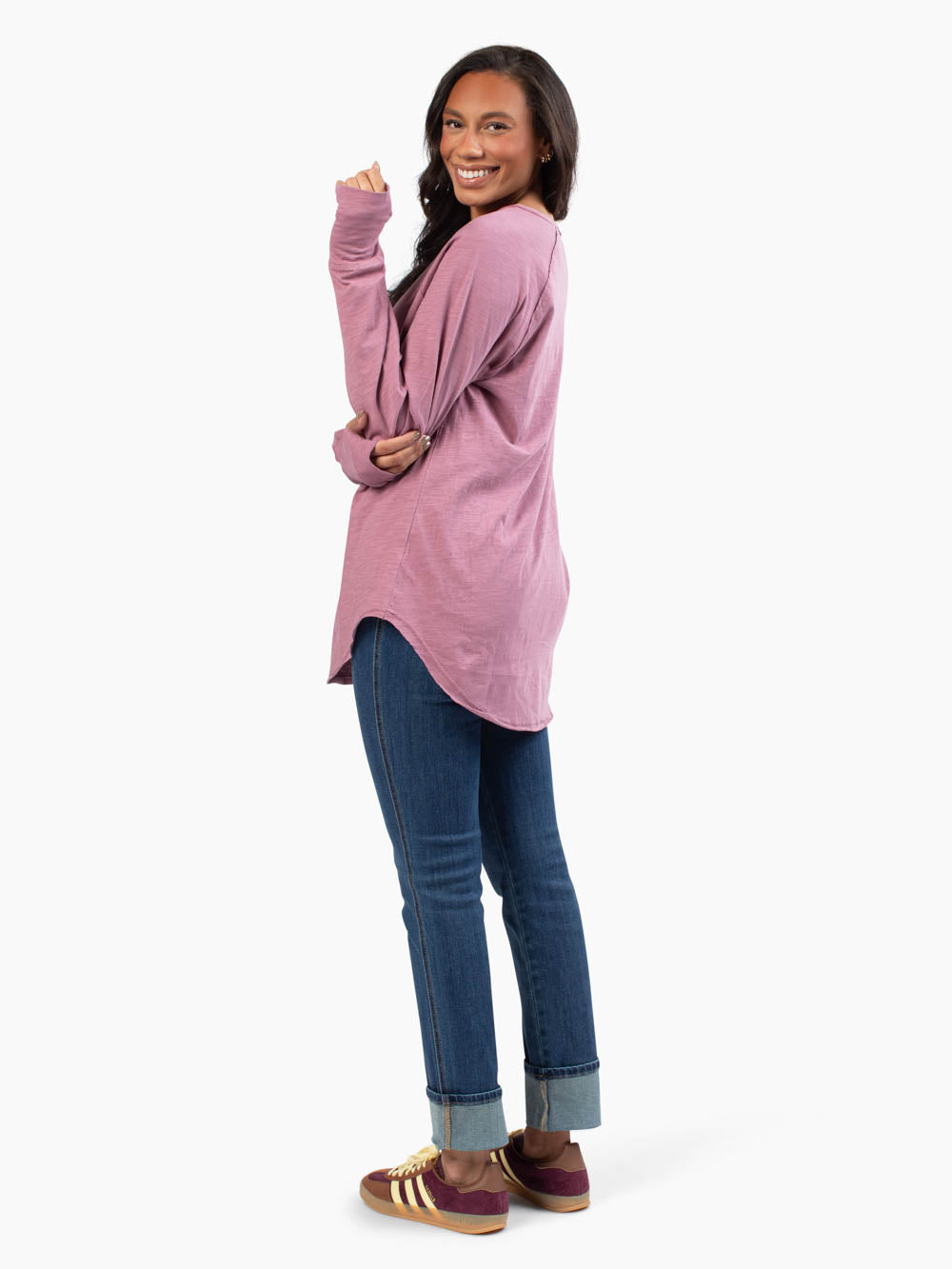 Tall woman wearing mauve purple long sleeve malley tee