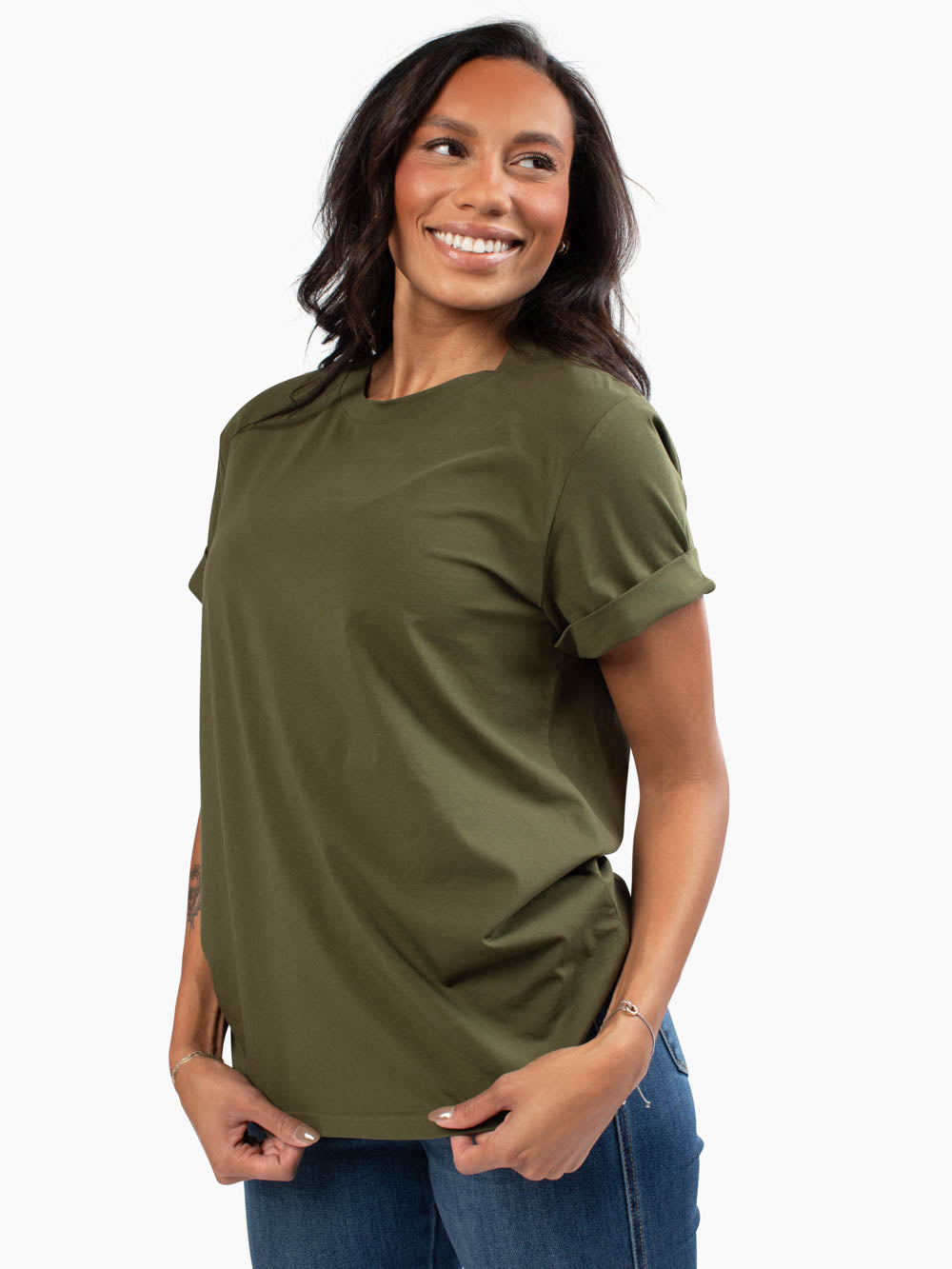 Tall woman wearing forrest green frame tee with cuffed sleeves and relaxed fit
