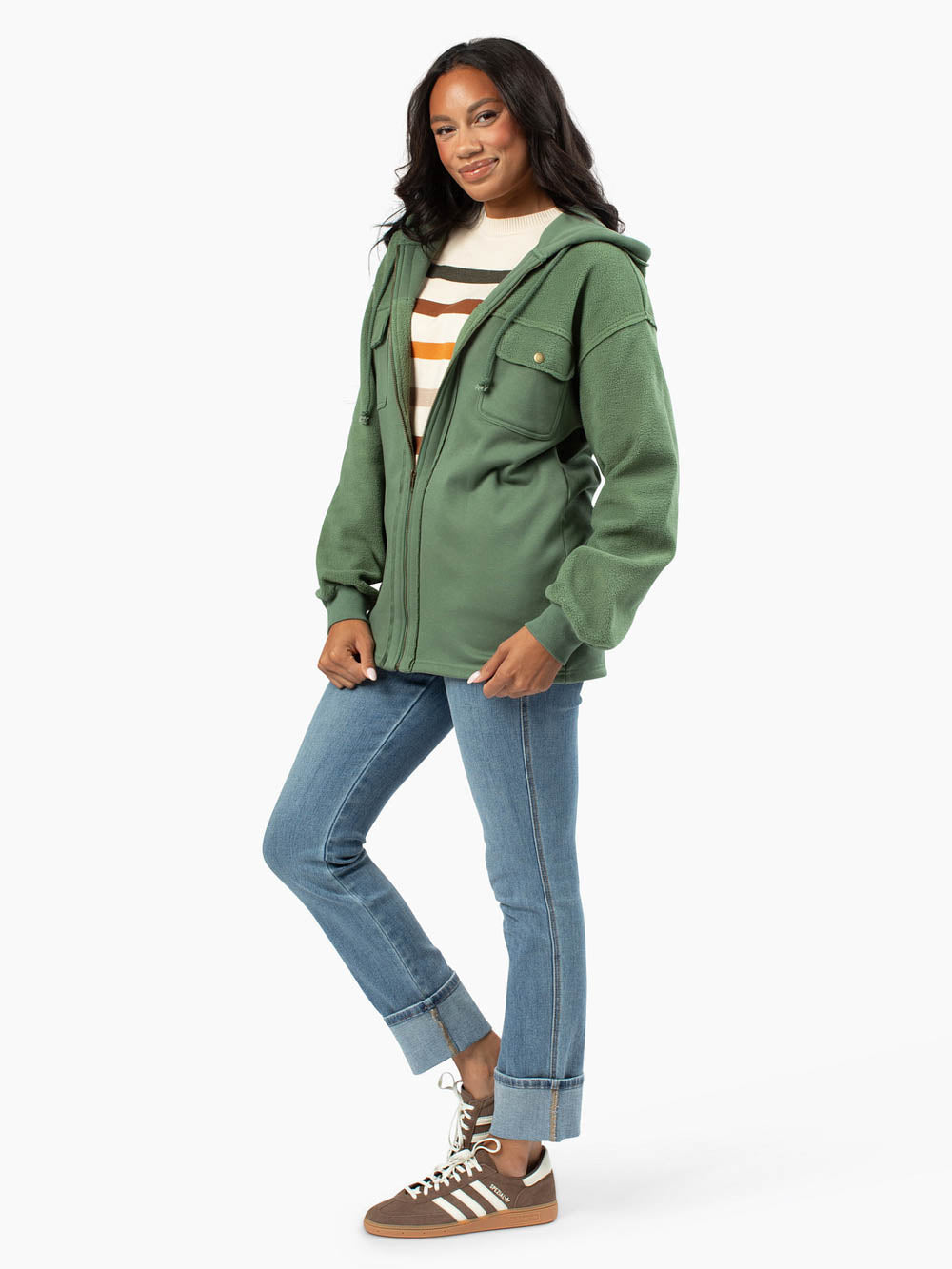 Tall model wearing green hoodie with front zip and hood