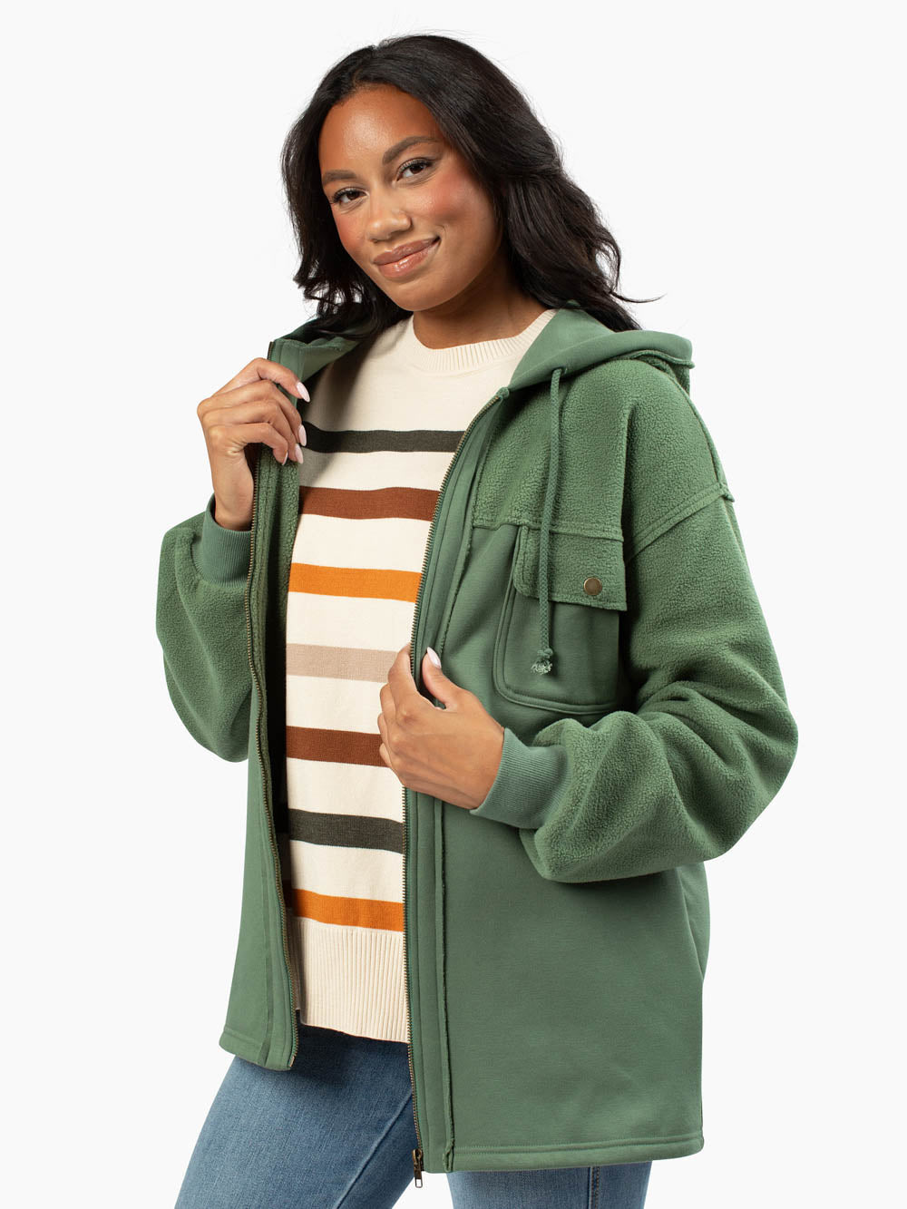 Close-up of mixed fleece and sweatshirt fabric on Oakley Hoodie in green