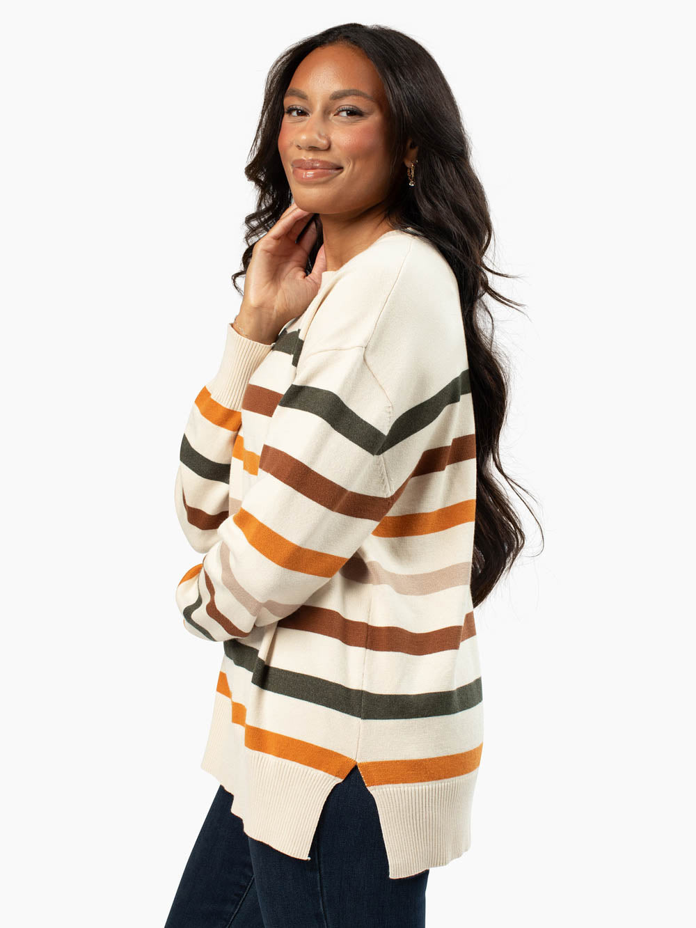Solvi sweater showing side slit detail and relaxed fit