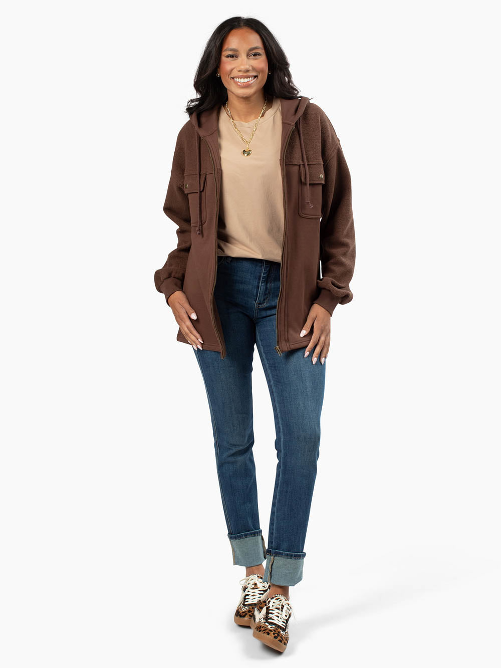 Tall woman wearing Oakley Zip-Up Hoodie in brown