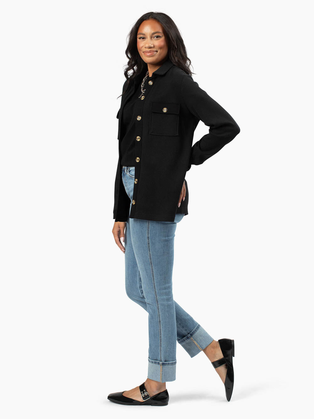 Side view showing long sleeves and relaxed tall fit