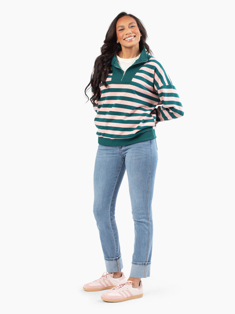 Tall model wearing pink and green striped sweatshirt