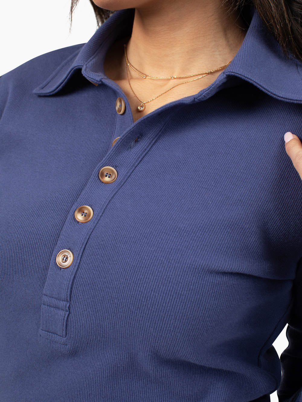 Close-up of ribbed fabric in Harbor Blue and polo collar detail