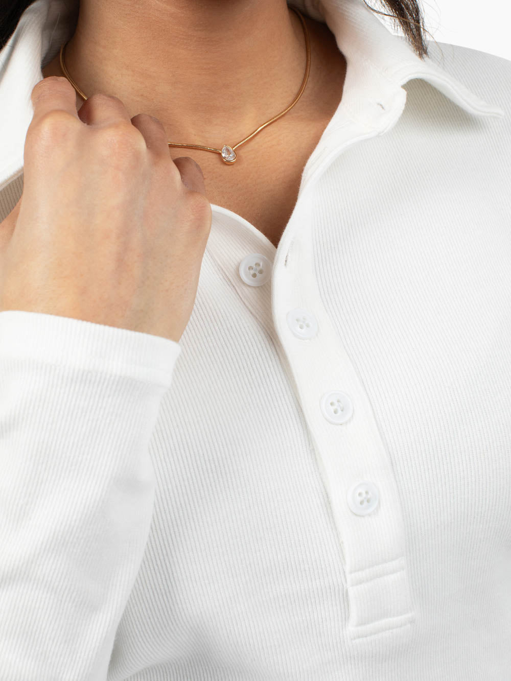 Close-up of ribbed fabric and polo collar detail