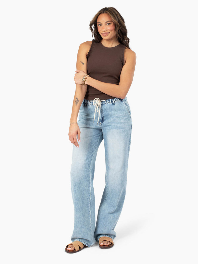 Chloe espresso ruffle tank styled with tall jeans front view