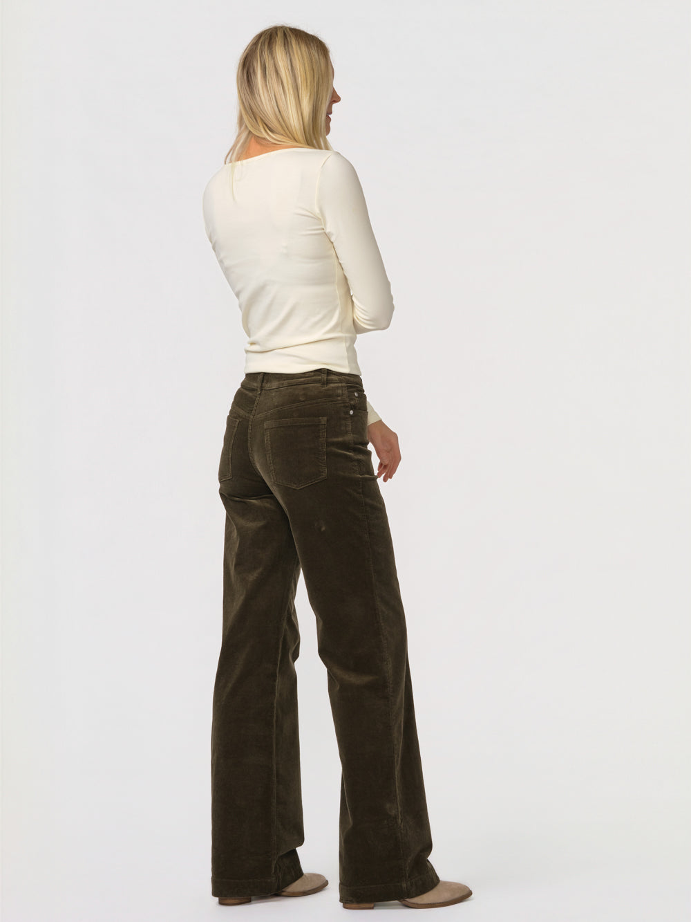 Back three-quarter view of the olive Daphne cord wide leg pant for tall women