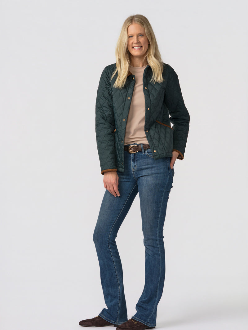 Langley quilted jacket for tall women in green, front view, worn open over a tan tee with bootcut jeans