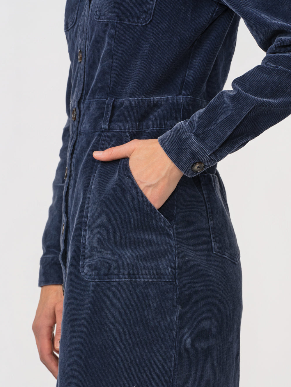 Close-up of the Odette corduroy dress hip pocket and long sleeve cuff