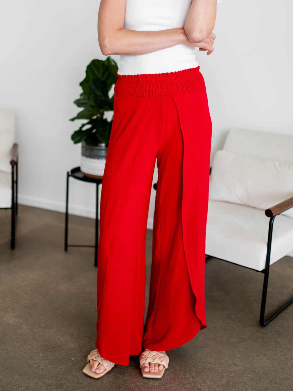 Front view of tall women’s culotte pants with smocked waistband and overlap detail